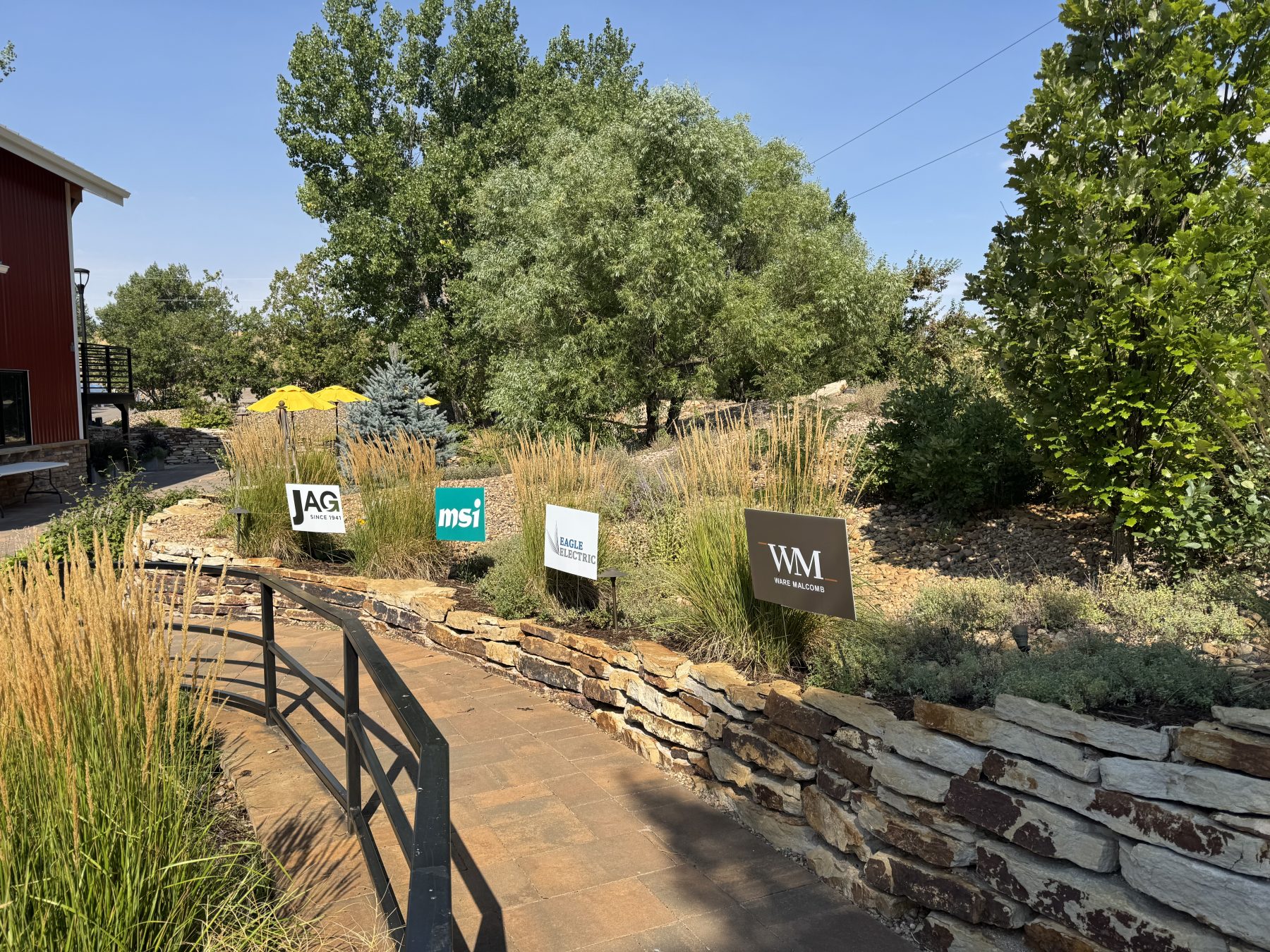 walkway with yard signs